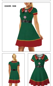 Détails de la robe de Noël avec boutons menthe poivrée et ceinture noire à la taille