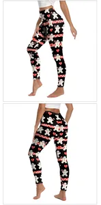 Détail de legging de Noël avec motifs festifs de bonhommes en pain d'épice et sucres d'orge