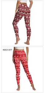 Detail of Christmas leggings featuring red plaid and reindeer patterns for yoga