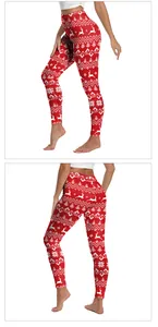 Close-up of red Christmas leggings featuring white elk and snowflake festive patterns