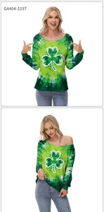 Close-up of women's St. Patrick's Day green tie-dye top with white shamrock print