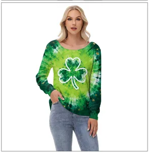 Detail of St. Patrick's Day off-shoulder top with shamrock print and green tie-dye texture