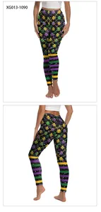 Detail of high waist Mardi Gras leggings with gold mask and purple fleur-de-lis prints