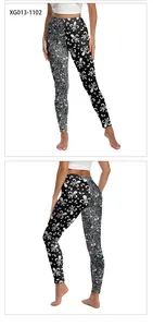 Front and back view of high waisted yoga leggings with asymmetrical fleur-de-lis pattern
