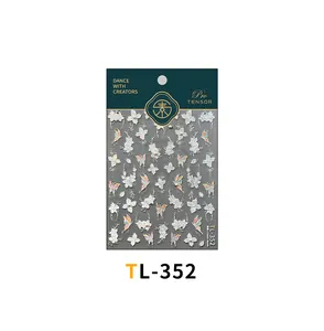 Detail of TL-352 nail stickers with 3D embossed white flowers and gradient butterflies