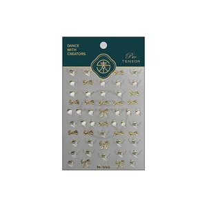 Golden bow and pink strawberry nail art stickers set M-998 on professional display card
