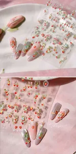 Close-up of M-993 strawberry nail stickers with 5D texture and sweet summer patterns