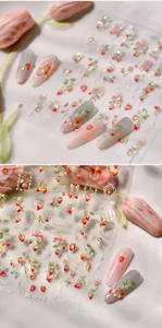 Close-up of strawberry nail stickers M-993 with holographic laser effect on nails