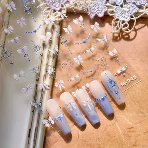 Autocollants ongles minimalistes bleu et blanc avec nœuds 3D et motif argenté M-945