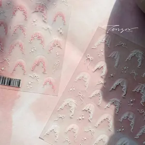 Detail of 5D pink French nail art stickers with white lace and bow patterns, style TS-4076