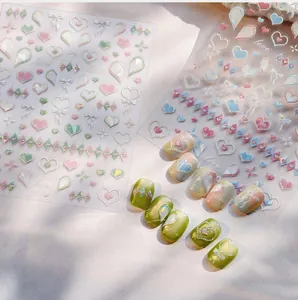 Detailed view of 5D heart embossed nail stickers M-999 with 3D texture and macaron colors