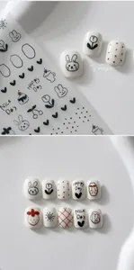 Détail de stickers à ongles mignons avec dessins de lapins, tulipes et fraises noirs