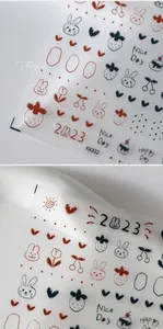 Détail des stickers ongles 3D en relief aux motifs mignons de lapin et cerise