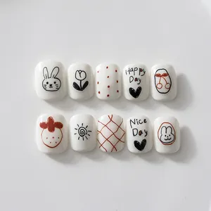 Autocollants à ongles mignons avec lapins et cerises dessinés à la main sur ongles blancs