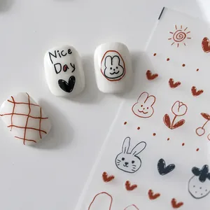Autocollants à ongles style coréen avec motifs de lapins, fruits et fleurs sur blanc