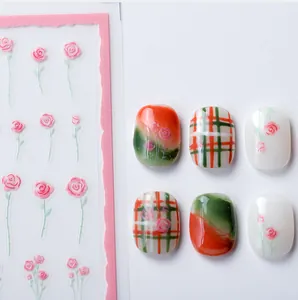 Stickers ongles 3D avec roses roses, motifs à carreaux vintage et détails en relief