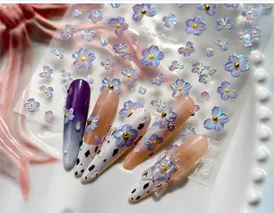 Detail of TL-370 3D embossed floral nail stickers with purple petals on various nail bases