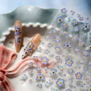 5D embossed floral nail stickers featuring purple and blue gradient flower patterns