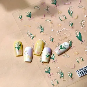 Autocollants 3D pour ongles motif muguet avec fleurs délicates et petits rubans