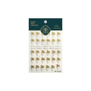 Golden embossed strawberry nail art stickers with M-1032 relief design on card