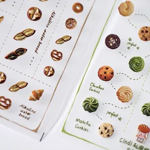 Realistic bread and pastry nail art stickers with croissant and cookie motifs
