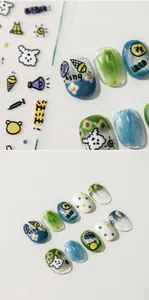 Detail of cute cartoon dog and food nail stickers with colorful patterns on white base