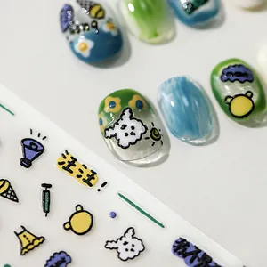 Cute cartoon puppy nail stickers with 3D embossed texture and colorful hand-drawn designs