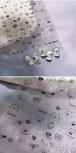 Détail des stickers ongles 3D M-1077 avec motifs mignons de chiots et de cœurs