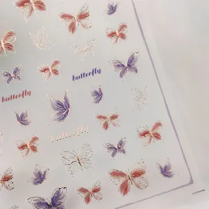 Goldgeprägte Schmetterlings-Nagelaufkleber mit lila und rosa 3D-Farbverlaufs-Designs