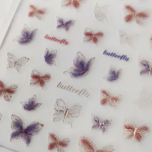 3D Schmetterling Nagelaufkleber mit lila Farbverlauf und goldenen Umrissen
