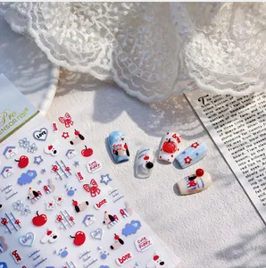 Détail des autocollants à ongles chiot et cerise avec affichage de nail art 3D