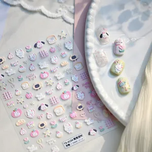 Macro detail of 3D embossed cartoon animal nail stickers with cute macaron candy patterns