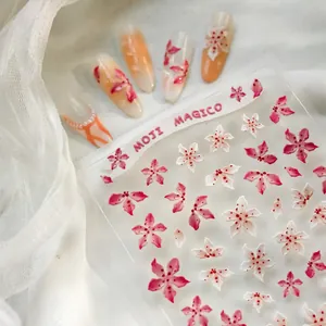 3D embossed floral nail decals in pink and white for elegant nail art decoration