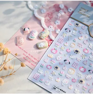 Detailed view of TS-4154 3D embossed nail stickers featuring cute rabbit and star patterns