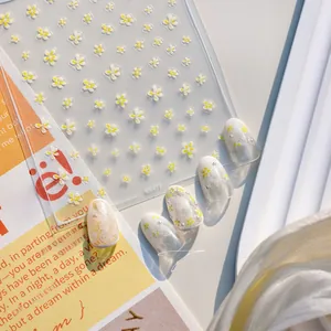 Detailed view of floral daisy nail stickers KX477 with 3D embossed texture and cream tips