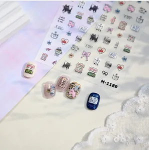 Detail view of cute hand-drawn cat and rabbit nail art stickers applied on manicured nails