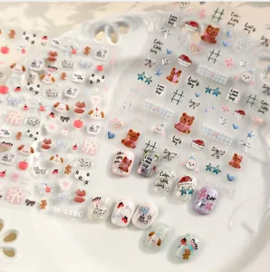 Detail showing cartoon nail stickers with bears and rabbits on a white vintage plate