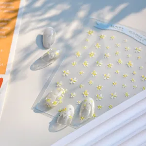 Elegant daisy floral nail stickers for manicure with matte finish and white lace patterns