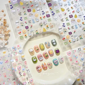 Detailed view of M-1203 embossed nail stickers with cute bear and heart graffiti designs