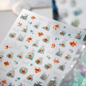 3D embossed goldfish nail art stickers with vibrant crystal texture and blue bubbles