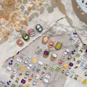 Cute panda and cat nail art stickers featuring rainbow and heart doodle illustrations