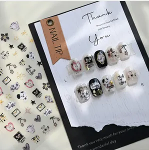 Detailed view of hand-drawn embossed nail stickers with cute floral and trendy patterns
