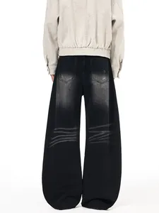Men's baggy distressed jeans with unique back pocket fading and vintage wash finish