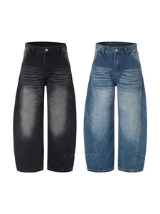Jeans larges rétro en noir et bleu clair avec coutures 3D incurvées et fini délavé