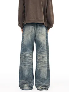 Men's vintage washed wide-leg jeans with whiskering and distressed finish back view