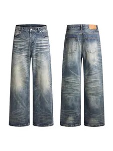 Vintage-wash wide-leg jeans featuring whiskers and retro distressed texture for men and women