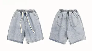 Front and back view of light blue denim shorts with elastic waist and white drawstring