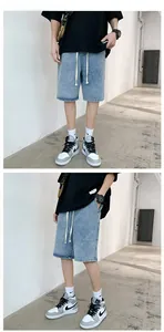 Detail view of light blue denim shorts featuring adjustable drawstring waist and relaxed fit