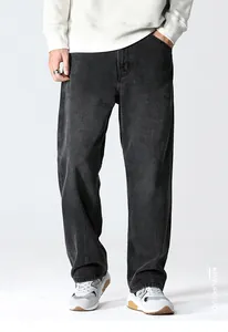 Loose fit dark grey denim pants with washed vintage finish and wide leg cut for men