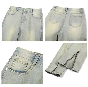 Details zur Distressed-Jeans mit gelbstichiger Waschung, Reißverschluss am Saum und Nieten